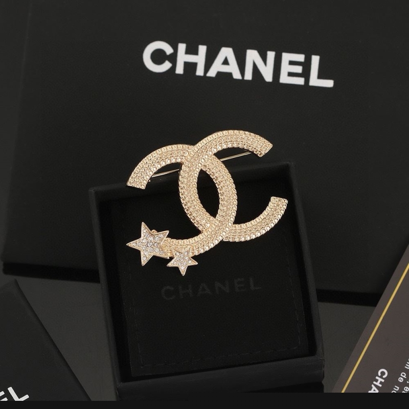 Ch*el brooches
